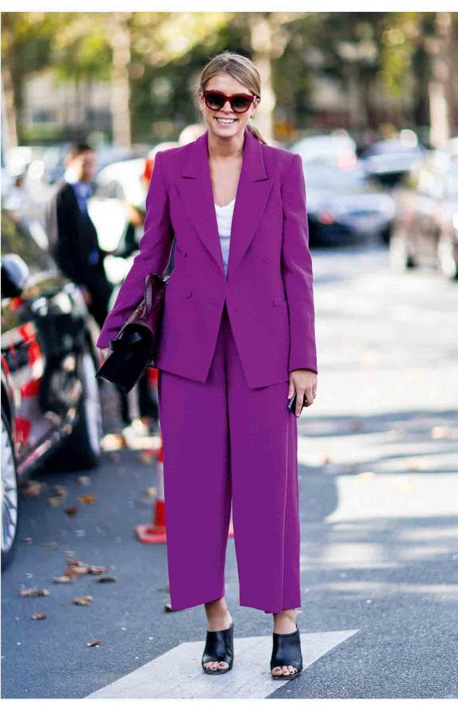 Paris Fashion Week showgoer demonstrates purple reign