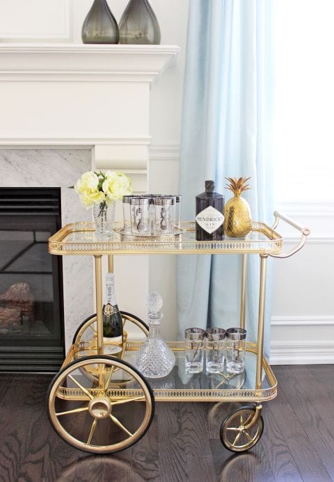 Michelle Shen of AM Dolce Vita blog achieved a high-end look by keeping her cart clear of clutter and showing off only the prettiest bottles and glasses, not to mention that adorable gold pineapple. Photography: Michelle Shen