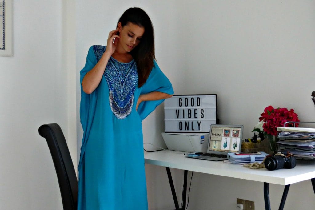 Founder and Creative Director of Island State Swimwear, Jenna Milne wears her latest resort wear line of caftans, Palma