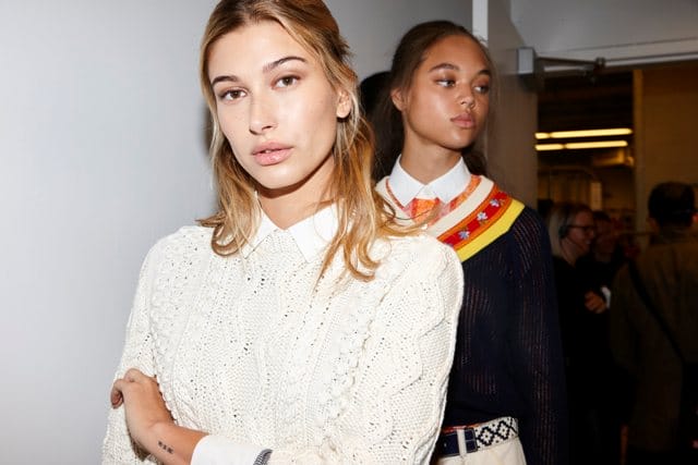 Kendal created faux freckles by drawing them on with brown eyeliner and patting them into the skin for a natural fade; as seen here on Hailey Baldwin.