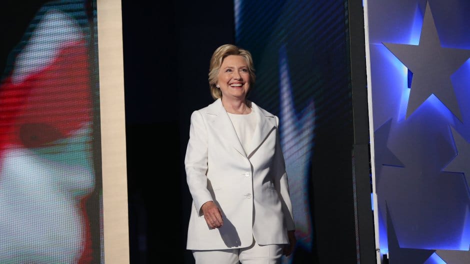 Hillary Clinton, 2016 Democratic presidential nominee, smiles while arriving on stage during the Democratic National Convention (DNC) in Philadelphia, Pennsylvania, U.S., on Thursday, July 28, 2016. Division among Democrats has been overcome through speeches from two presidents, another first lady and a vice-president, who raised the stakes for their candidate by warning that her opponent posed an unprecedented threat to American diplomacy. Photographer: Daniel Acker/Bloomberg via Getty Images