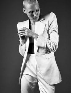 Blazer; and pants, both from Saint Laurent by Anthony Vaccarello.