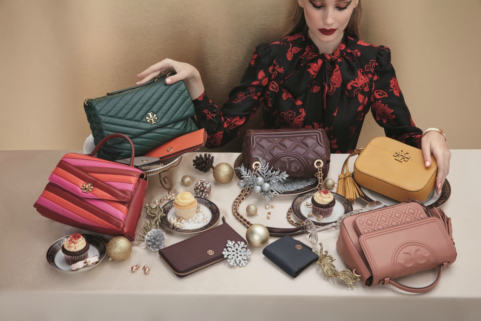 From left to right: Kira Chevron Colour-Block Top-Handle Satchel; Kira Chevron Convertible Shoulder Bag; Fleming Soft Convertible Shoulder Bag; Fleming Convertible Shoulder Bag; McGraw Camera Bag; top; wallets; and jewellery, all from Tory Burch.