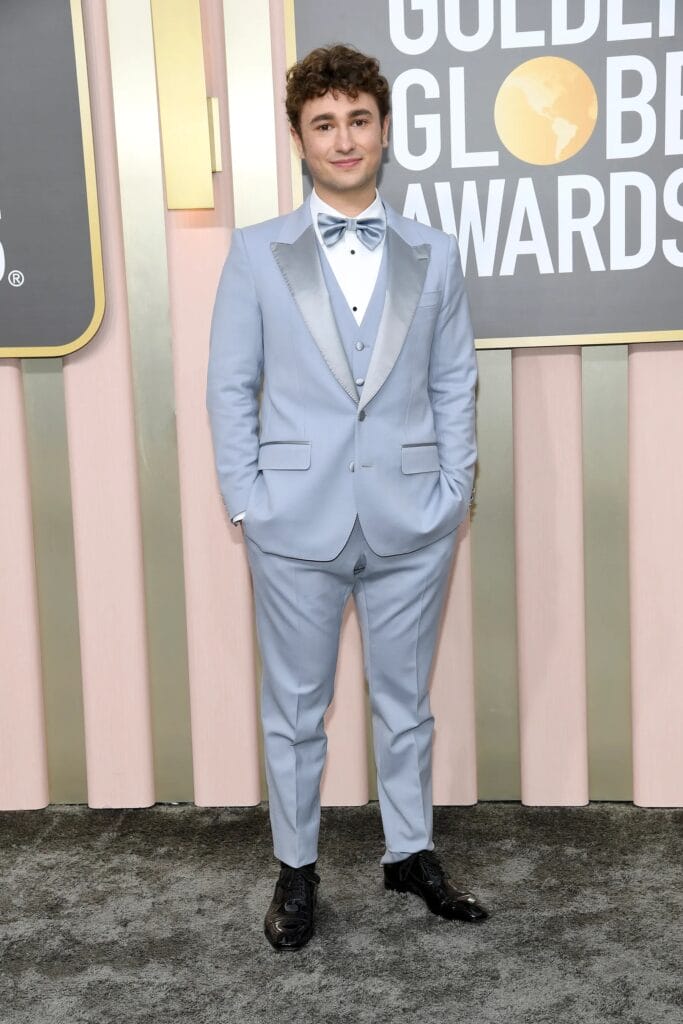 Gabriel LaBelle takes on a baby blue hue for his three piece suit combo.