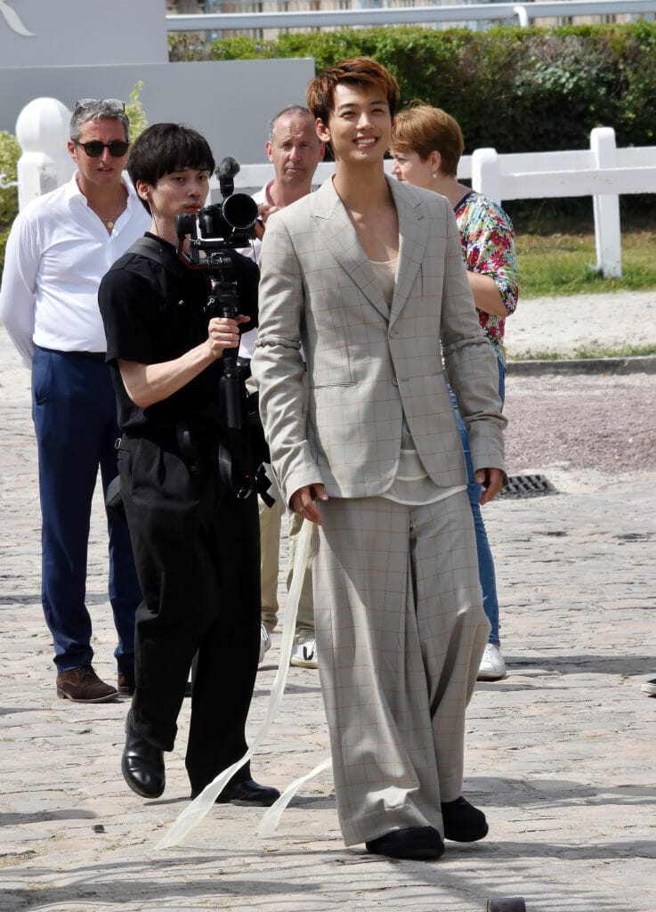 Ryōma Takeuchi attends the Dior Homme Menswear Spring/Summer 2024 show.