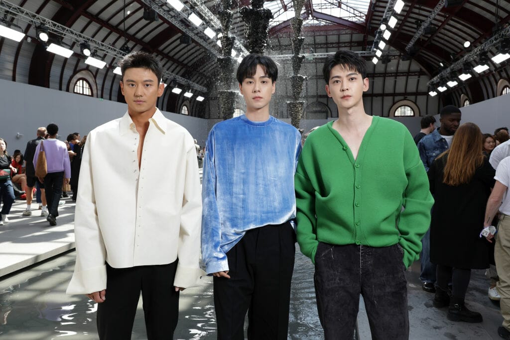 Ning Zetao, Hu Yitan and Tang Xiaotian attends the Loewe Menswear Spring/Summer 2024 