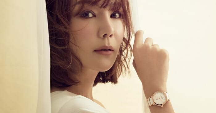 Actress Tong Bing Yu wearing Rado Centrix watch