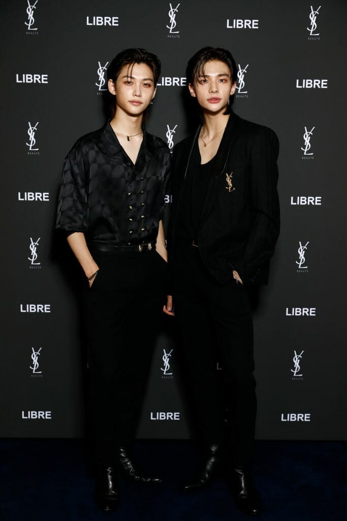 Felix (L) and Hyunjin from the Stray Kids attend the YSL Beauty X Dua Lipa event (Photo by Julien M. Hekimian/WireImage).