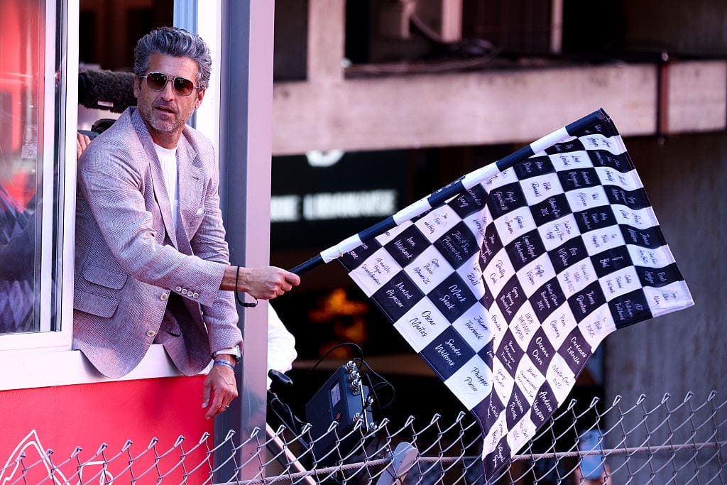 atrick Dempsey waves the chequered flag during the F1 Grand Prix Of Monaco on May 25, 2025 in Monte-Carlo, Monaco